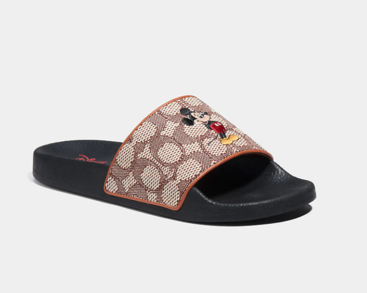 Disney X Coach Sport Slide In Signature Textile Jacquard With Mickey Mouse Embroidery. Image via Coach.