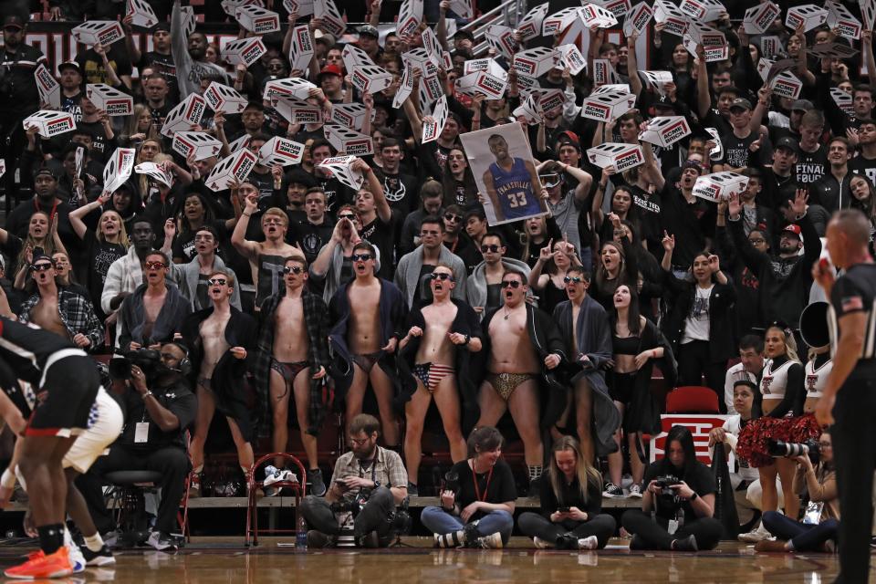 Texas Tech fans try to distract Kentucky during the second half of an NCAA college basketball game Saturday, Jan. 25, 2020, in Lubbock, Texas. (AP Photo/Brad Tollefson)