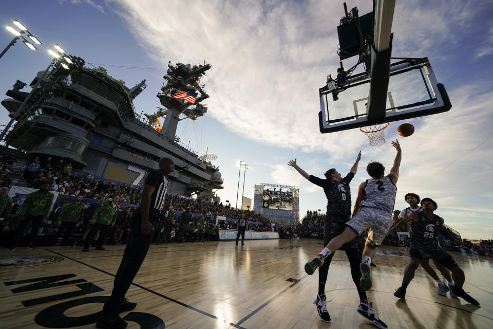 Gonzaga forward Drew Timme (2) shoots against Michigan State forward Jaxon Kohler (0) during the first half of the Carrier Classic NCAA college basketball game aboard the USS Abraham Lincoln in Coronado, Calif. Friday, Nov. 11, 2022. (AP Photo/Ashley Landis)