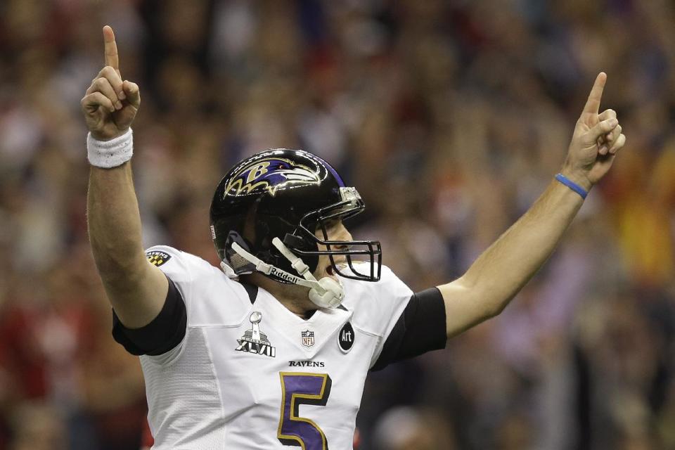 Baltimore Ravens quarterback Joe Flacco (5) reacts to a 13-yard touchdown pass caught by wide receiver Anquan Boldin (81) against the San Francisco 49ers in the first quarter of the NFL Super Bowl XLVII football game, Sunday, Feb. 3, 2013, in New Orleans. (AP Photo/Patrick Semansky)