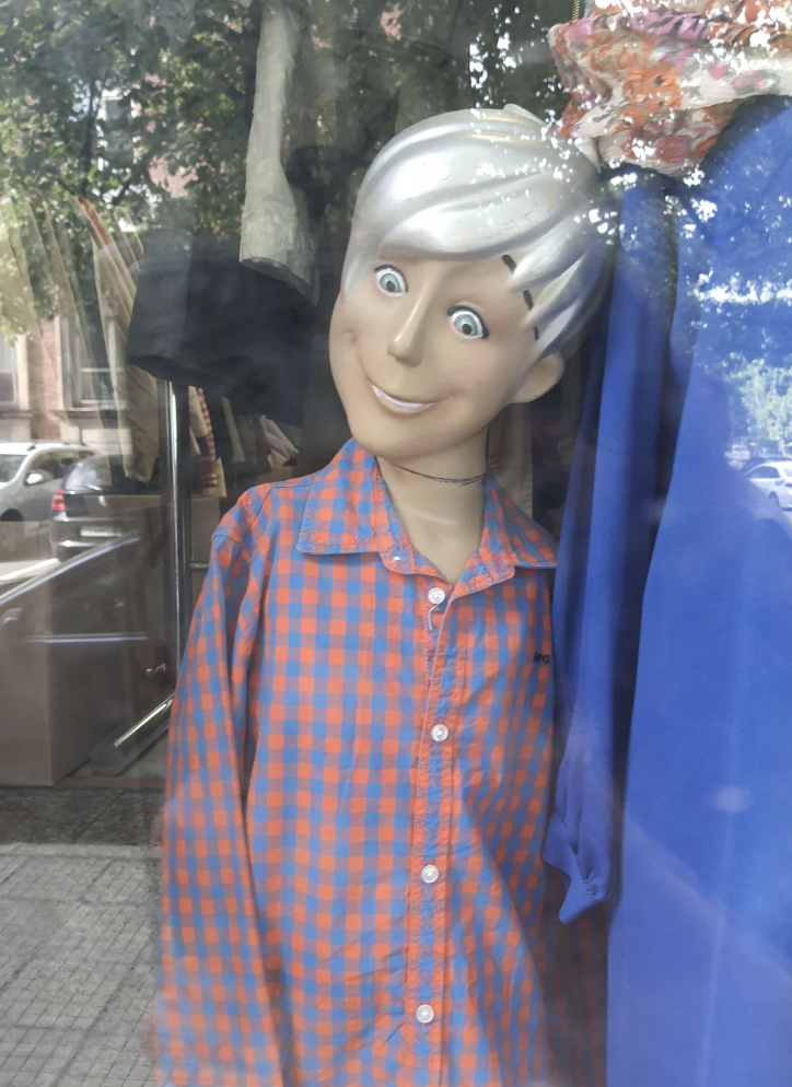 A mannequin of a little boy