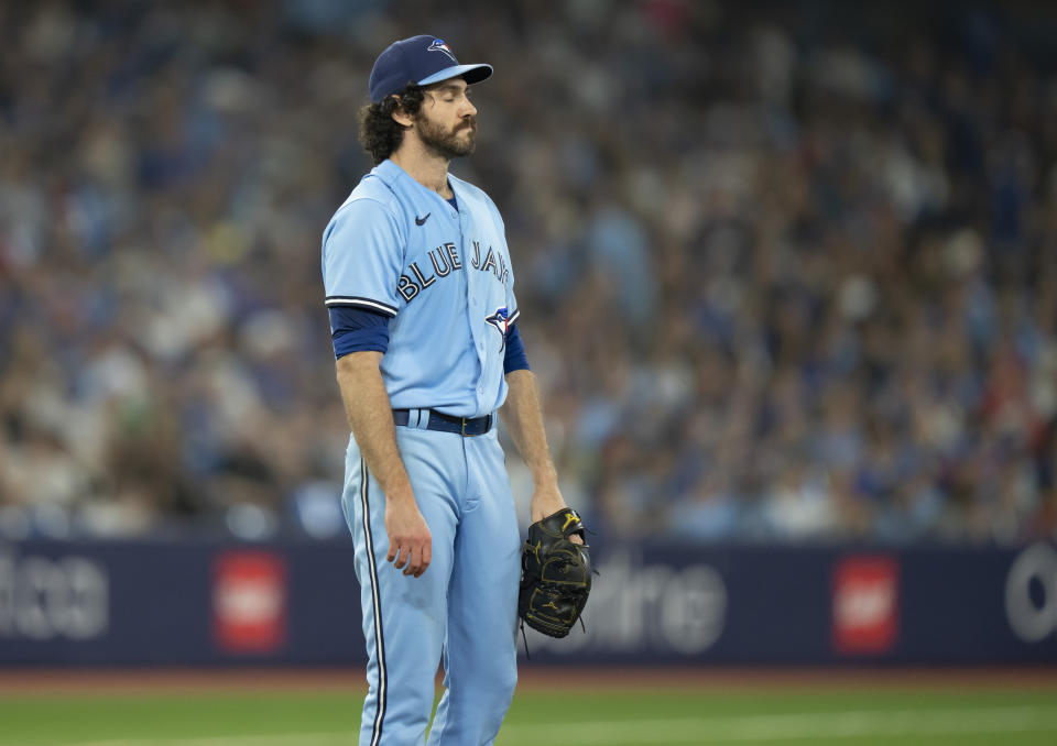 Toronto Blue Jays pitcher Jordan Romano reacts after giving up solo homer to Boston Red Sox' Alex Verdugo duringt he ninth inning of a baseball game in Toronto, Sunday, July 2, 2023. (Frank Gunn/The Canadian Press via AP)