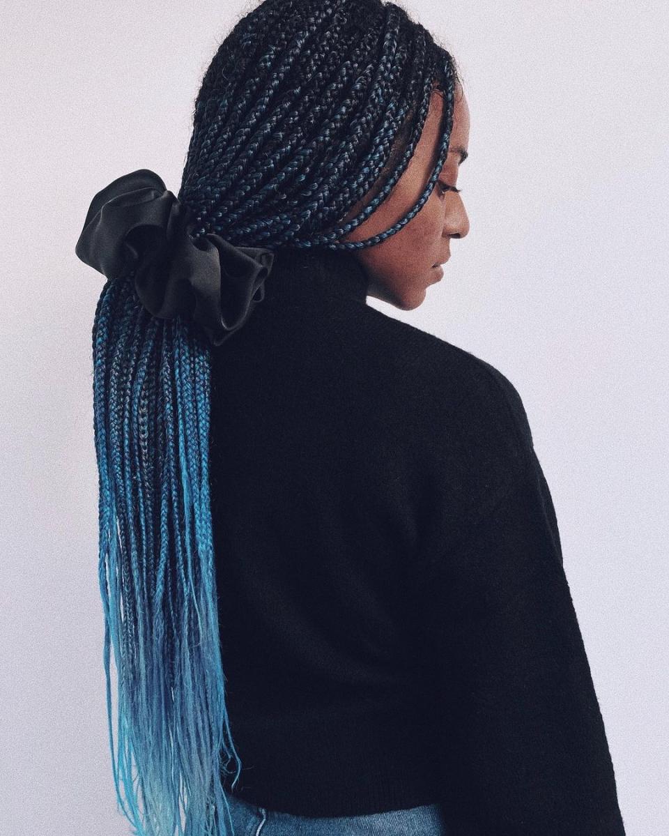 Pull back your braids with an oversized silk scrunchie, like <a href="https://cna.st/affiliate-link/27P8TNNyQAyC6L4wnFJ3AExNCm6b6pMvmK4e6EsxGkVy2tGCGHwsVxAQzQD6rgD4Rvrg3zGABZ5bmDbMBKB7FWcqipZ8SSPc5mnDeQqQViR8EsmsEjPvfmR1YZREgnNZ4w6dKbYiL93JAFxaLdaoSMbFSUy71Hs?cid=601afb8ec845ac6453a22d99" rel="nofollow noopener" target="_blank" data-ylk="slk:this one;elm:context_link;itc:0;sec:content-canvas" class="link ">this one</a> from Kristin Ess.