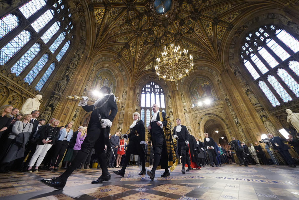 LONDON, ENGLAND - MAY 10: Lady Usher of the Black Rod, Sarah Clarke (2nd left) and Speaker of the House of Commons Lindsey Hoyle (3rd left) walk through the Central Lobby at the Palace of Westminster ahead of the State Opening of Parliament in the House of Lords on May 10, 2022 in London, England. The State Opening of Parliament formally marks the beginning of the new session of Parliament. It includes Queen's Speech, prepared for her to read from the throne, by her government outlining its plans for new laws being brought forward in the coming parliamentary year. This year the speech will be read by the Prince of Wales as HM The Queen will miss the event due to ongoing mobility issues. (Photo by Yui Mok - WPA Pool/Getty Images)