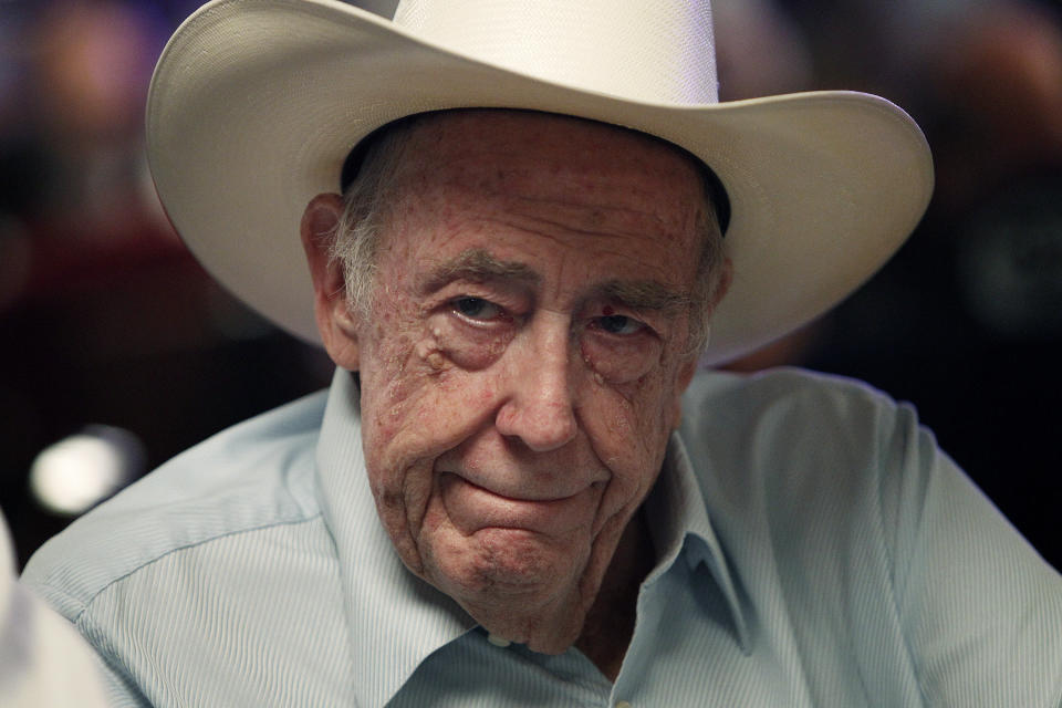 FILE - Doyle Brunson plays on the third day of the World Series of Poker main event in Las Vegas on July 11, 2013. Brunson, one of the most influential poker players of all time and a two-time world champion, died Sunday, May 14, 2023, according to his agent. He was 89. (John Locher/Las Vegas Review-Journal via AP, File)