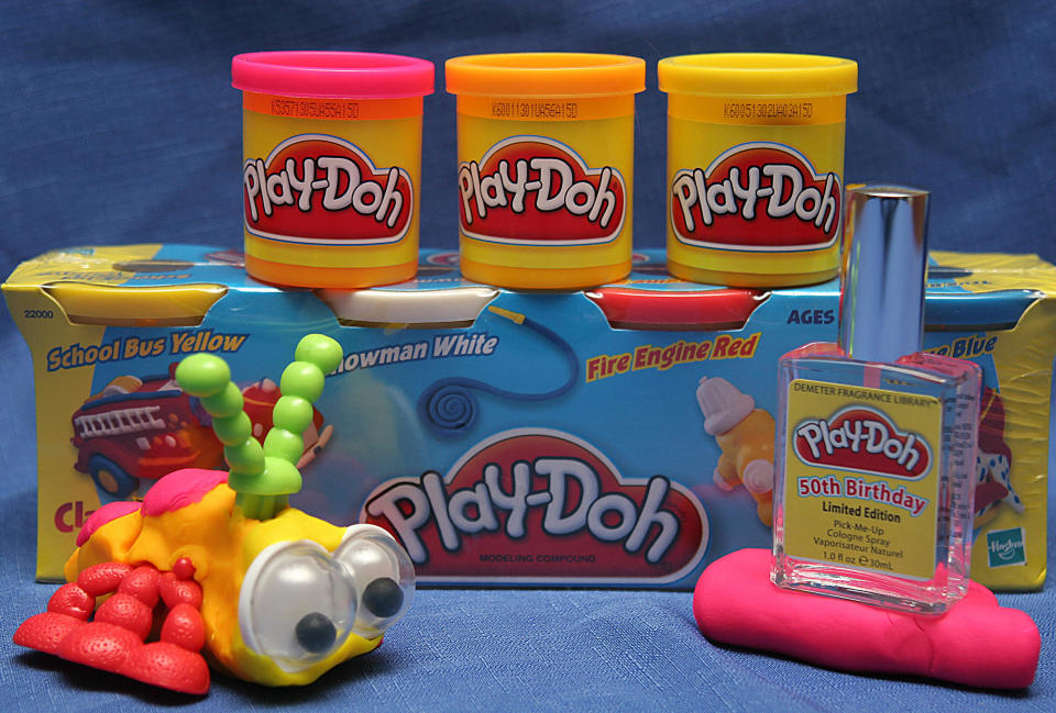 Manassas, UNITED STATES:  This 24 May, 2006 image shows a bottle of "Play-Doh" cologne (R), a fragrance released by Pawtucket, Rhode Island.-based toymaker Hasbro and the Demeter Fragrance Libray, the cologne?s New York manufacturer and distributor, as part of a year-long celebration of the beloved modeling compound's 50th birthday. "Play-Doh" compound's distinctive aroma will be available in a limited-edition 1-ounce spray bottle priced at 19 USD and a four-ounce (113 gram) bottle for 39.50 USD. A can of Play-Doh costs about 50 cents USD. Signatures of the Play-Doh brand is its scent,? Play-Doh is one of those scents that seems to evoke a very strong emotional response in everyone, because we all remember those good times as kids playing with Play-Doh," said Mark Crames, CEO of Demeter Fragrance Library. AFP PHOTO/Karen BLEIER  (Photo credit should read KAREN BLEIER/AFP via Getty Images)