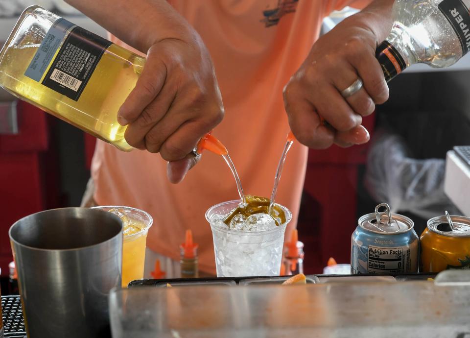 The staff and customers of the Little Jim Bait & Tackle enjoy an afternoon at the restaurant and boat docks on Tuesday, Nov. 22, 2022 in Fort Pierce. 