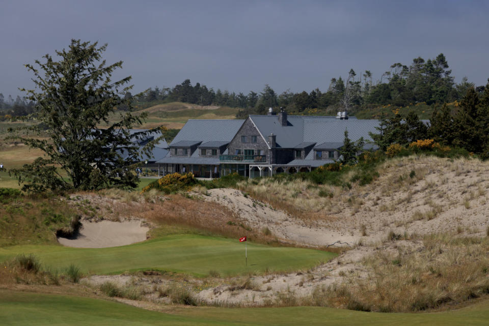 A view of The Lodge at Bandon Dunes with the green on the 13th hole on The Bandon Preserve par-three course designed by Bill Coore and Ben Crenshaw.<p>David Cannon / Contributor / Getty Images</p>