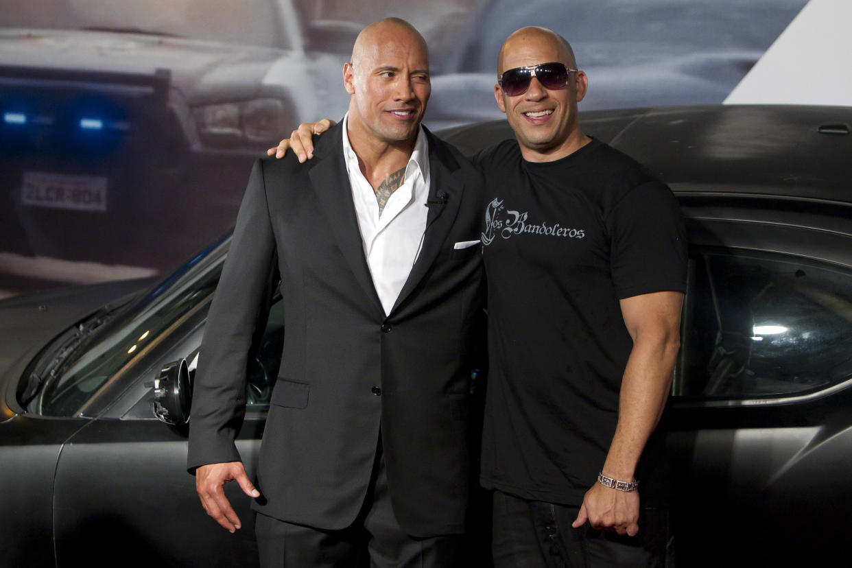 RIO DE JANEIRO, BRAZIL - APRIL 15:   Dwayne Johnson (The Rock) and Vin Diesel (R) pose for photographers during the premiere of the movie 