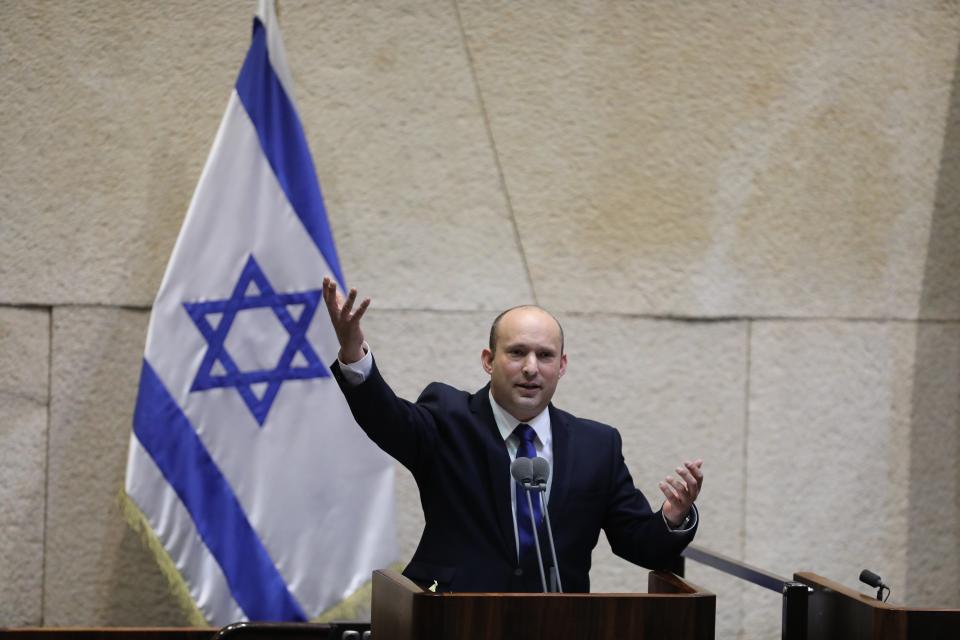 Naftali Bennett speaks during a special voting session on the formation of a new coalition government at the Knesset, the Israeli parliament (EPA)