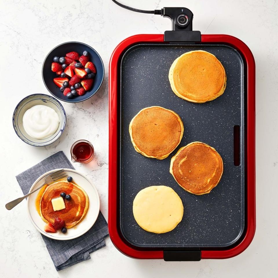 <p>Pancakes aren't just for weekends! Make a double batch on Saturday and freeze for a quick morning meal all week.</p><p>Get the <a href="https://www.goodhousekeeping.com/food-recipes/a35563354/greek-yogurt-pancakes-recipe/" rel="nofollow noopener" target="_blank" data-ylk="slk:Greek Yogurt Pancakes recipe;elm:context_link;itc:0;sec:content-canvas" class="link "><strong>Greek Yogurt Pancakes recipe</strong></a>.</p>