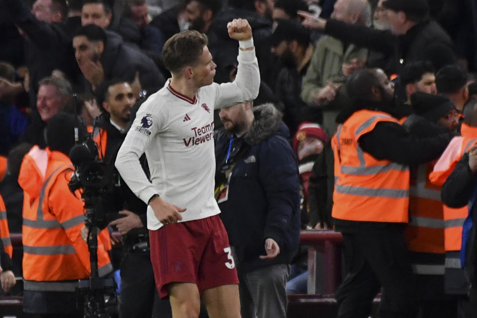 Manchester United's Scott McTominay celebrates after scoring his side's second goal during the English Premier League soccer match between Aston Villa and Manchester United at the Villa Park stadium in Birmingham, England, Sunday, Feb. 11, 2024. (AP Photo/Rui Vieira)