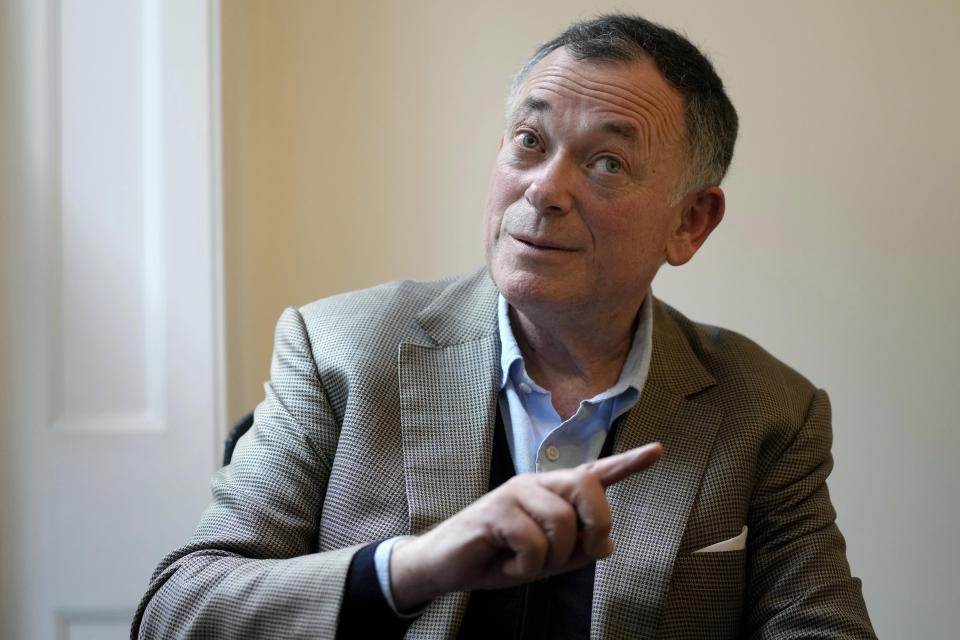 Businessman Ian Maxwell, brother of Ghislaine Maxwell gestures during an interview at his office in London, Monday, Nov. 15, 2021. The brother of a British socialite charged with helping Jeffrey Epstein exploit underage girls says her prosecution is “the most over-hyped trial of the century,” designed to break a woman targeted by authorities desperate to blame someone for the late financier’s crimes. Ghislaine Maxwell continues to have the backing of her family, and a family member will be in court at all times to show their support, Ian Maxwell said in an interview ahead of the trial, which is set to begin Nov. 29 in U.S. District Court in Manhattan. (AP Photo/Kirsty Wigglesworth)