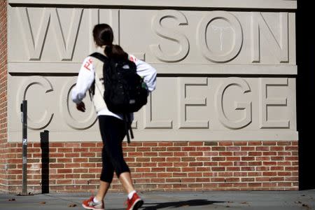 A student walks toward Princeton University's Wilson College in Princeton, New Jersey, November 20, 2015. REUTERS/Dominick Reuter