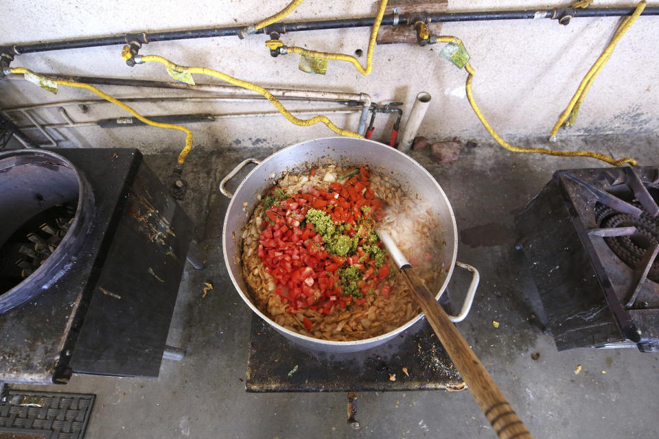 ***HOLD FOR RELIGION TEAM STORY*** Mixed vegetables boil, as food is an important part of the Shri Guru Ravidass Sabha ceremony at a temple in Fresno, Calif. Sunday, May 7, 2023. Members of the Ravidassia community in California are followers of Guru Ravidass, a 14th century Indian guru of a caste formerly considered untouchable. The Ravidassia community statewide is advocating for new legislation to outlaw caste-based discrimination. (AP Photo/Gary Kazanjian)