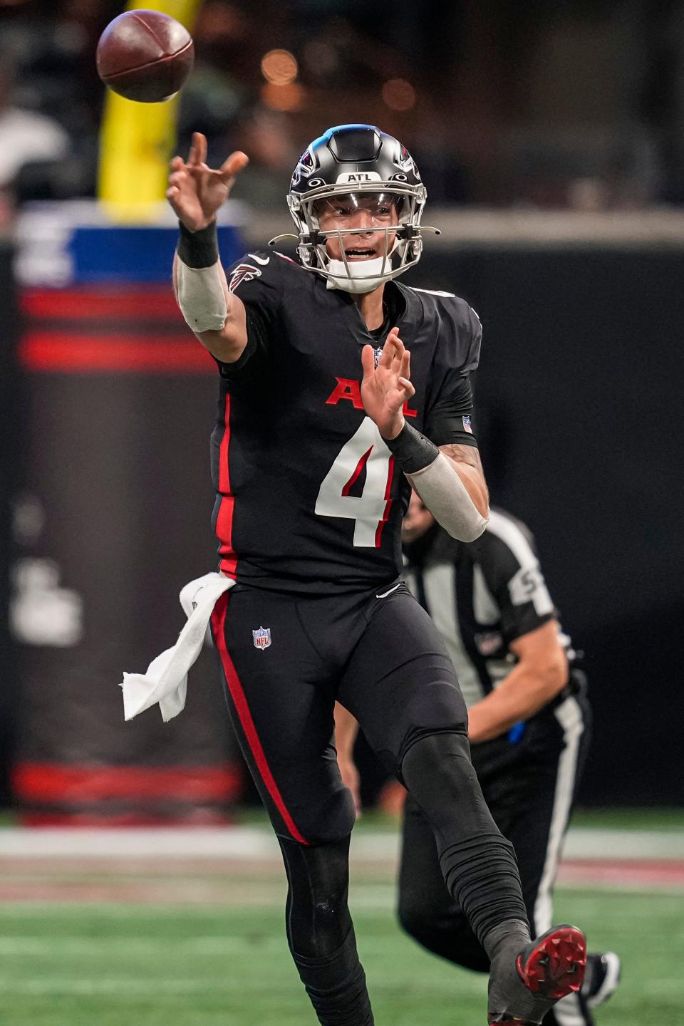 Jan 1, 2023; Atlanta, Georgia, USA; Atlanta Falcons quarterback Desmond Ridder (4) passes against the Arizona Cardinals during the first half at Mercedes-Benz Stadium.