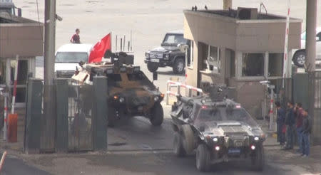Military convoy leaves the border compound at the Habur Border Gate between Turkey and Iraq in this still image taken from video, October 31, 2017. REUTERS TV/ via REUTERS