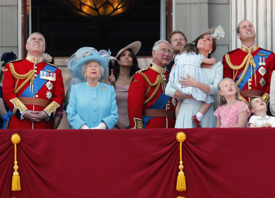 FILE - From left, Britain's Prince Andrew, Queen Elizabeth, Meghan Duchess of Sussex, Prince Charles, Prince Harry, Kate Duchess of Cambridge and Prince William attend the annual Trooping the Colour Ceremony in London, Saturday, June 9, 2018. Queen Elizabeth II is marking her 96th birthday privately on Thursday, April 21, 2022 retreating to the Sandringham estate in eastern England that has offered the monarch and her late husband, Prince Philip, a refuge from the affairs of state. (AP Photo/Frank Augstein, File)