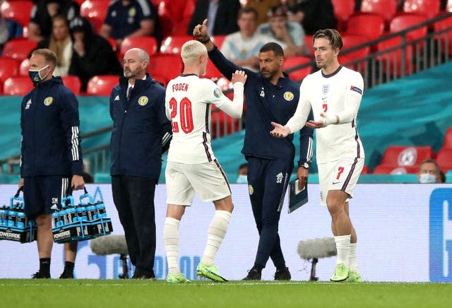 Jack Grealish, right, replaces Phil Foden