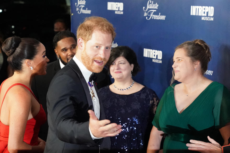 Britain's Prince Harry (3rd L), Duke of Sussex and Meghan (L), Duchess of Sussex, speak to award winners including Barbara Block (2nd R) and Kyle Hines (R) as they arrive to the Intrepid, Sea Air & Space Museum's inaugural Intrepid Valor Awards on November 10, 2021 in New York. (Photo by Bryan R. Smith / AFP) (Photo by BRYAN R. SMITH/AFP via Getty Images)