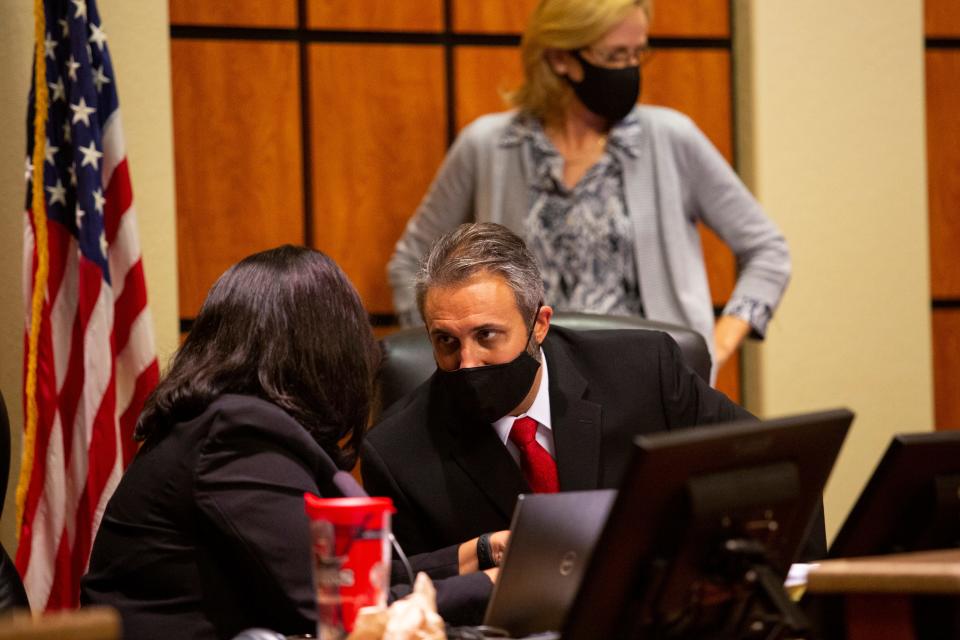 Interim Superintendent Ken Savage talks to attorney Kathy Dupuy-Bruno following the Lee County School Board meeting where he was sworn in on Monday, June 14, 2021.