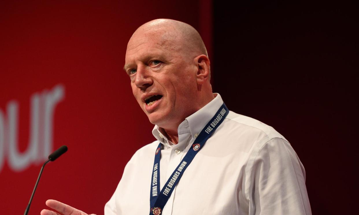 <span>Matt Wrack, general secretary of the Fire Brigades Union, addresses a Labour conference.</span><span>Photograph: Leon Neal/Getty</span>