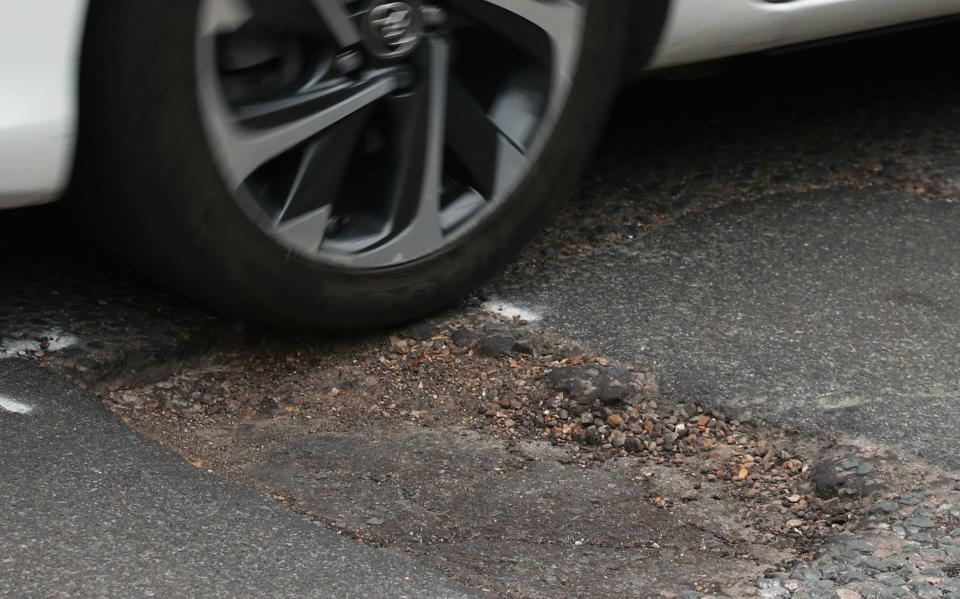 County Councils Network found 85 per cent of councils planned to cut amount of road maintenance schemes next year - Yui Mok/PA