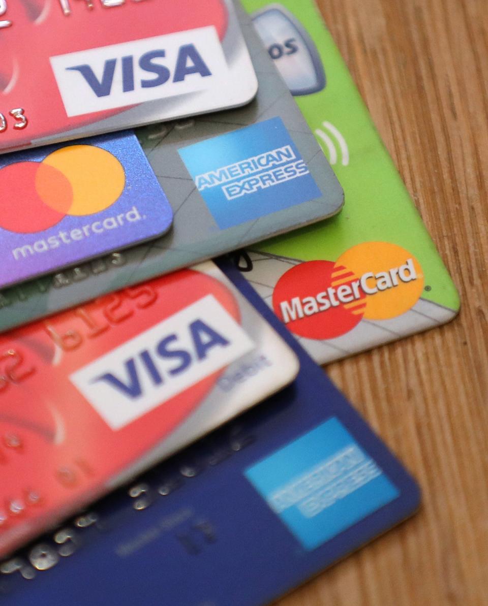 Credit card spending has shot up by a third (PA) (PA Wire)