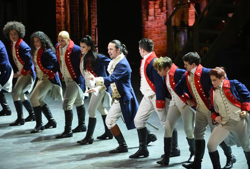 In this June 12, 2016 file photo, Lin-Manuel Miranda, center, and the cast of "Hamilton" perform at the Tony Awards in New York.