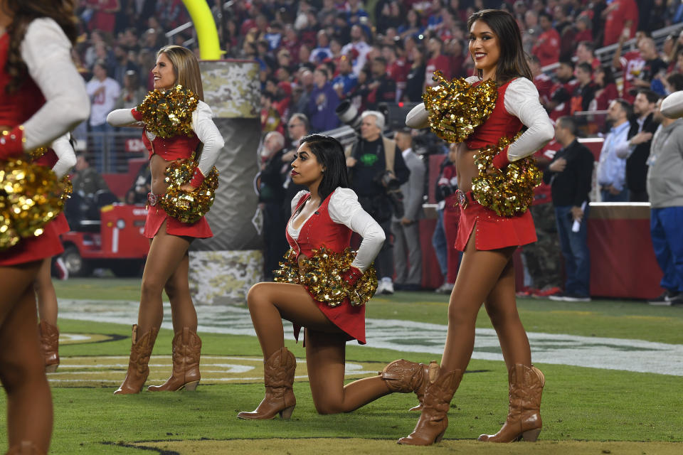 SANTA CLARA, CA - NOVEMBER 12: A San Francisco 49ers Gold Rush cheerleader kneels during the national anthem prior to the NFL game between the San Francisco 49ers and the New York Giants at Levi's Stadium on November 12, 2018 in Santa Clara, California. (Photo by Thearon W. Henderson/Getty Images)