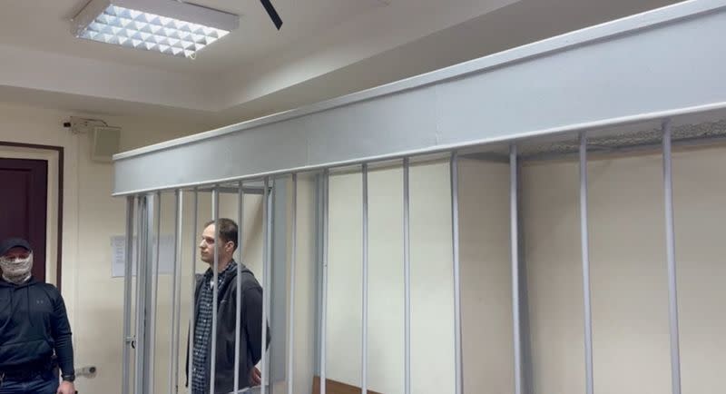 Wall Street Journal reporter Evan Gershkovich attends a court hearing in Moscow