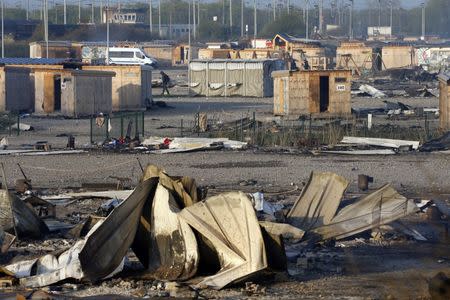 General view of shelters the day after a fire destroyed large swathes of the Grande-Synthe migrant camp near Dunkirk in northern France April 11, 2017 following skirmishes on Monday that injured several people. REUTERS/Pascal Rossignol