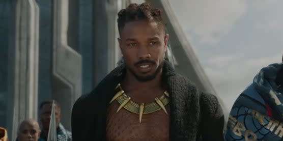 Kilmonger standing outside the palace in Wakanda with his army in "Black Panther"