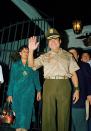 <p>Military strongman Gen. Manuel Antonio Noriega waving to supporters outside the presidential palace in Panama City on March 22, 1988. (AP Photo/John Hopper) </p>