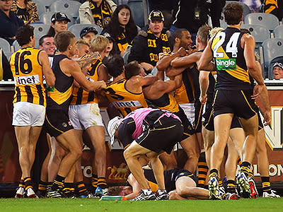 Players brawl after a high bump from Josh Gibson fires up the match.