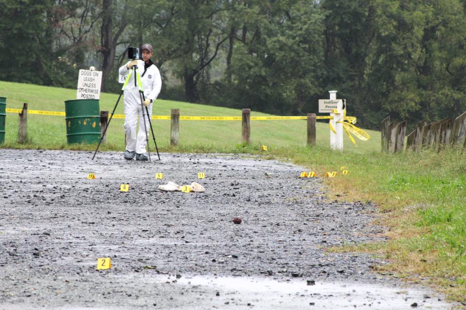 New Castle County Police investigate a "suspicious death" after a woman's body was found in a wood line in Carousel Park on Sept. 26, 2023. The body turned out to be Cynthia Amalfitano.