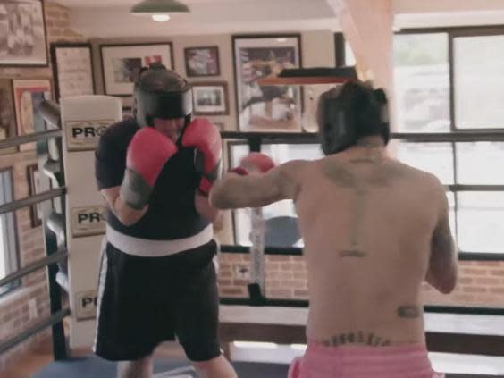James Corden (left) got more than he bargained for when sparring with David Beckham (right) (CBS)
