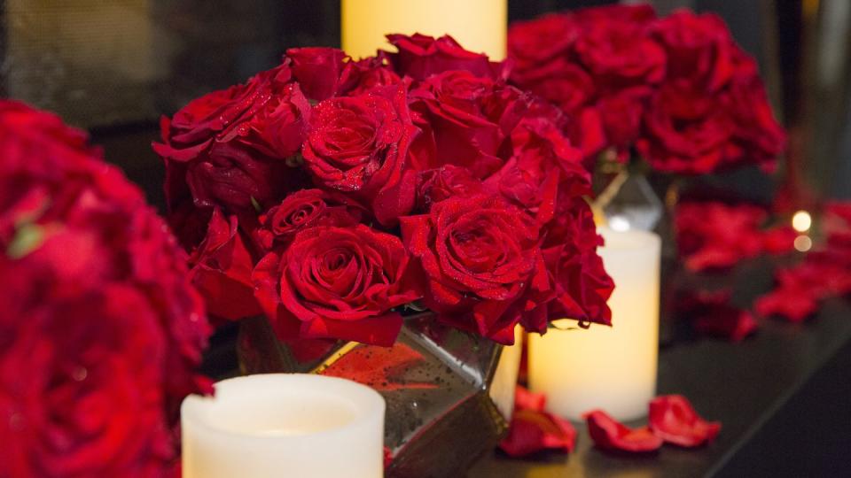 Rose Bouquets and Candles Background