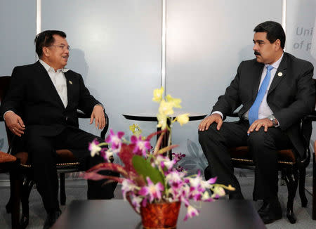 Venezuela's President Nicolas Maduro (R) attends a private meeting with Indonesia's Vice President Jusuf Kalla during the 17th Non-Aligned Summit in Porlamar, Venezuela September 18, 2016. Miraflores Palace/Handout via REUTERS