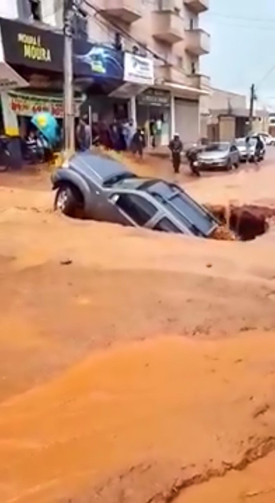 The car was eventually lifted out by a crane, local media reports. Source: CEN/ Australscope