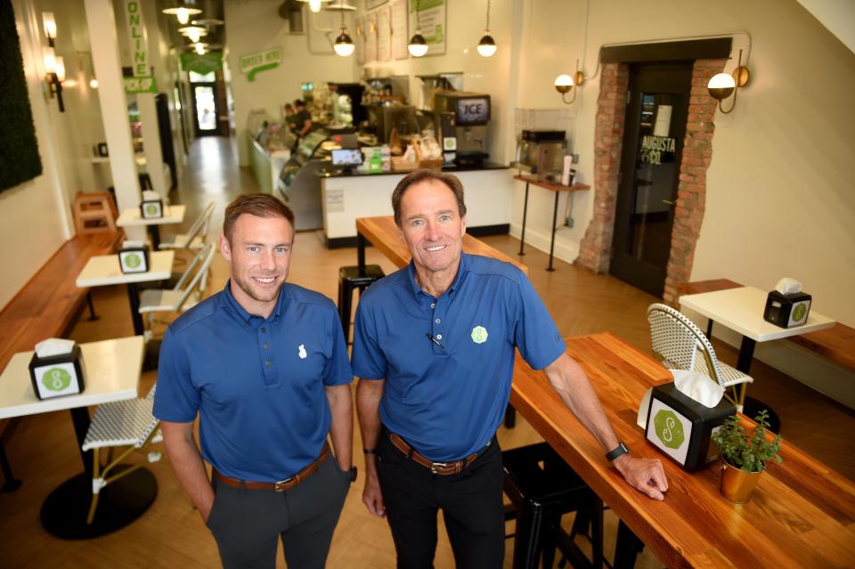 FILE - Havird Usry, left, and Brad Usry stand in their restaurant, The Southern Salad, on Broad Street in Augusta, Ga., Tuesday afternoon May 19, 2020. Southern Salad is one of Augusta's top spot for salads, according to Yelp.