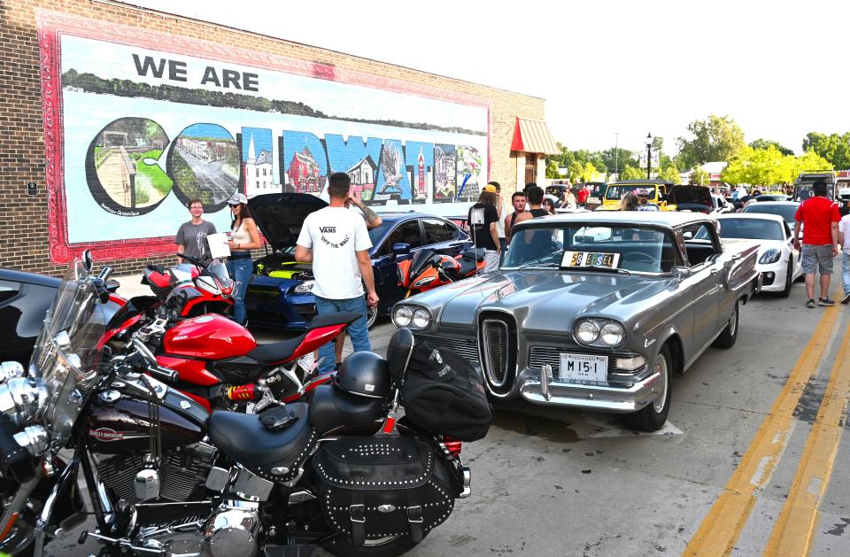 Cars and motorbikes filled Hanchett Street and much of the Tibbits parking lot Wednesday night for Petrol N' Pints.