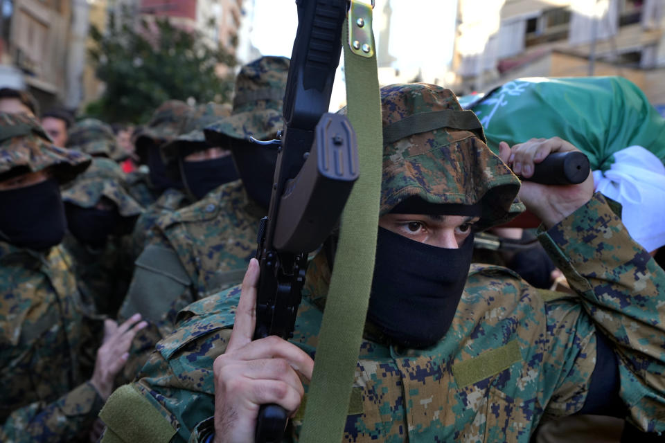 Islamic Group known as Jamaa Islamiya carry the body of their comrade Mohammad Riad Mohyeldin, who was killed in an apparent Israeli strike on Sunday, during his funeral procession in Beirut, Lebanon, Tuesday, March 12, 2024. (AP Photo/Bilal Hussein)