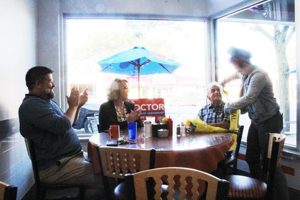 City of Howell representatives celebrate at Mark's Midtown Coney after revealing that Gerald Knight would be the 2022 Howell Melon Festival Grand Marshal on Tuesday, June 28. Pictured left to right, Howell City Manager Erv Suida, Executive Administrative Assistant to the city manager Kym Lockhart, Knight and City of Howell Communications Specialist Danica Katnik.