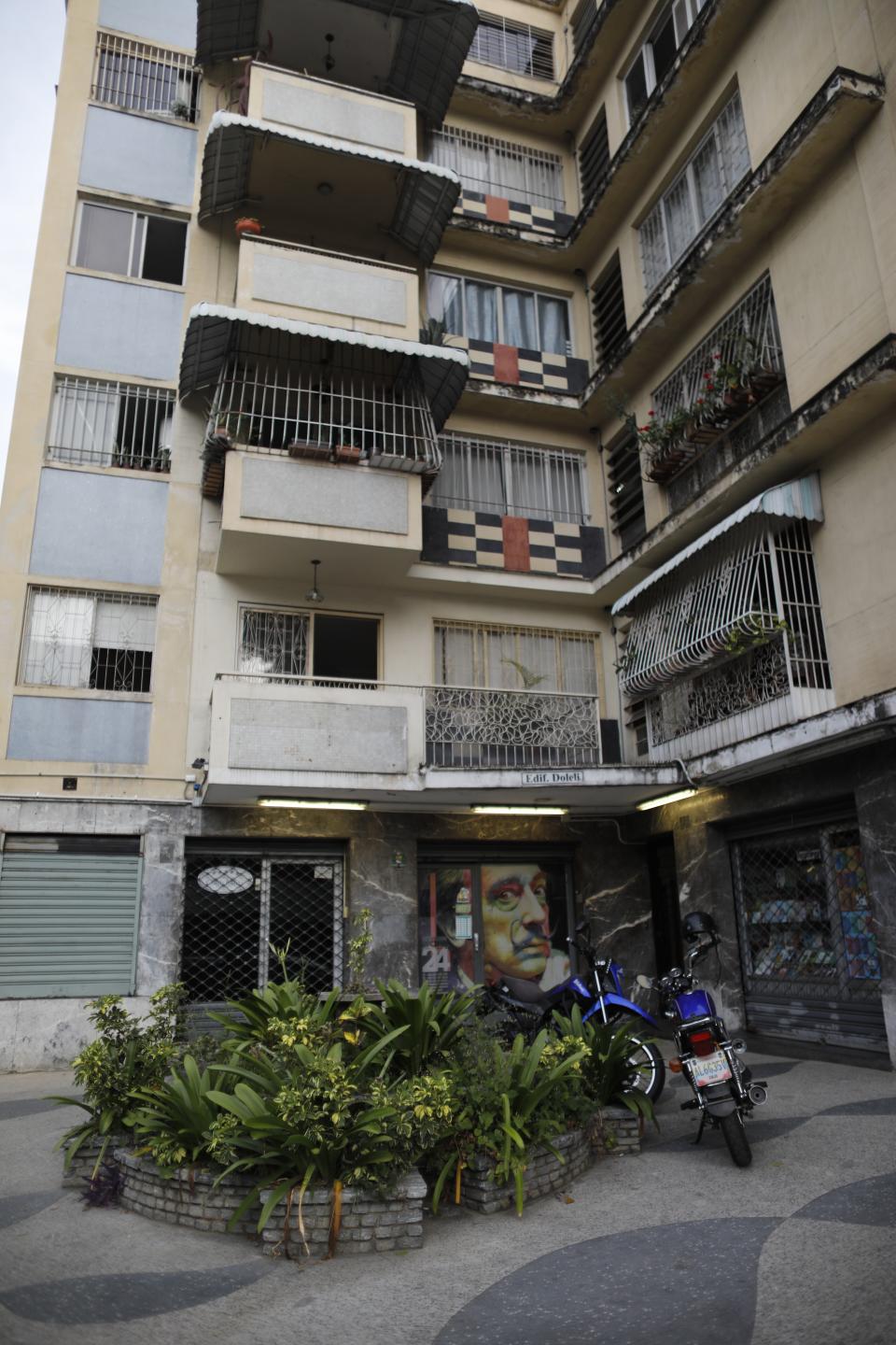 The Doleli building stands in Caracas, Venezuela, Tuesday, July 23, 2019. The Doleli Building was constructed in 1956 by Italian migrants and at the time stood as a symbol of Venezuela’s urban progress, according to a resident whose family was among the building’s earliest tenants. (AP Photo/Ariana Cubillos)