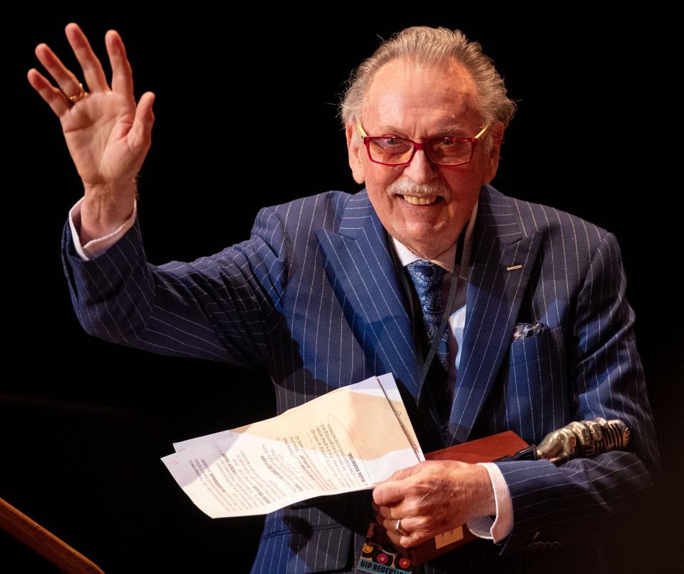 Jim Gaines waves to the audience during the Memphis Music Hall of Fame induction ceremony on Thursday, Sept. 15, 2022, at the Cannon Center for the Performing Arts in Memphis.