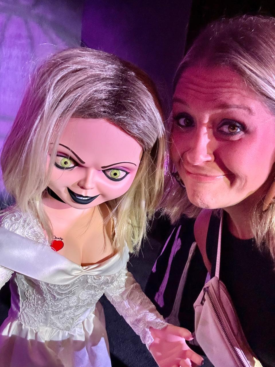 The author and a Bride of Chucky doll at Halloween Horror Nights