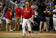 <p>Rep. Joe Barton (R-TX) carries the trophy after the victorious Democrats presented it to the Republicans following the annual Congressional Baseball Game at Nationals Park in Washington, June 15, 2017. (Photo: Joshua Roberts/Reuters) </p>