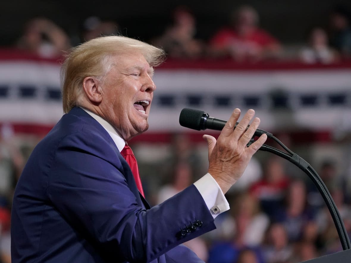 Former U.S. president Donald Trump speaks at a rally in Wilkes-Barre, Pa., Saturday, Sept. 3, 2022. The House committee investigating the Jan. 6 attack on the Capitol on Friday issued a subpoena demanding his testimony. (Mary Altaffer/The Associated Press - image credit)