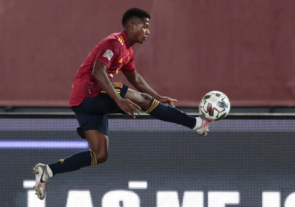 Spain's Ansu Fati is airborne as he attempts to control the ball during the UEFA Nations League soccer match between Spain and Ukraine at the Estadio Alfredo Di Stefano stadium in Madrid, Spain, Sunday, Sept. 6, 2020. (AP Photo/Bernat Armangue)